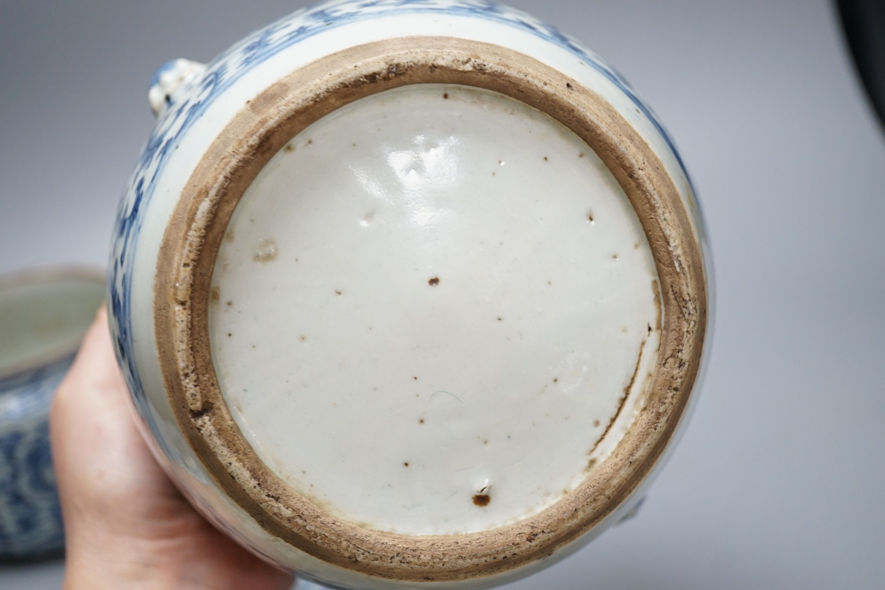 Two Chinese blue and white jars and covers - tallest 20cm high